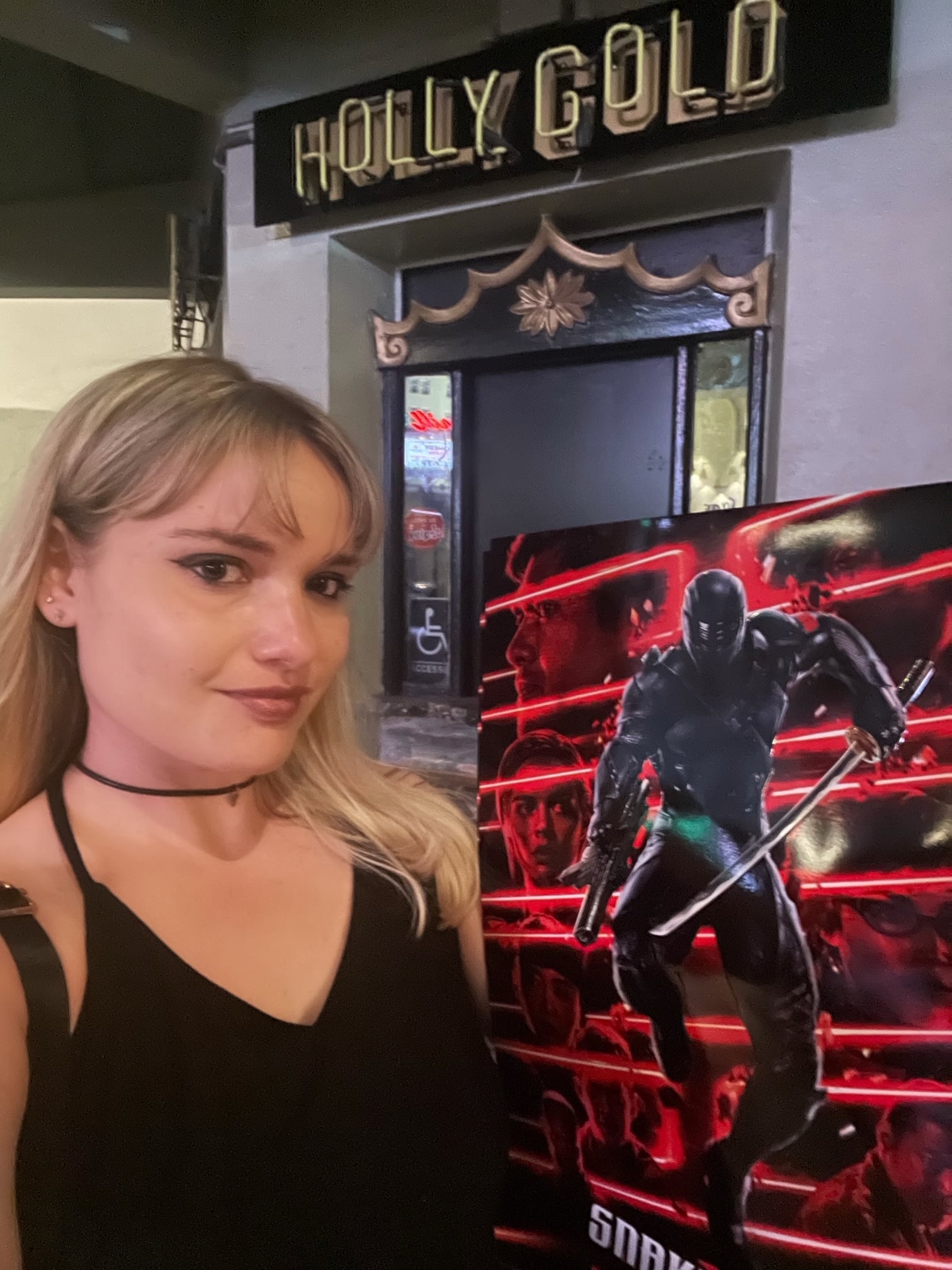 Holly with a Snake Eyes Poster